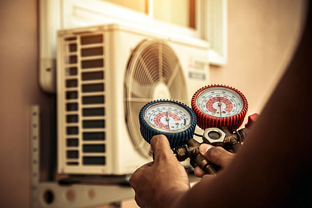 Professional Hvac technician working in Newark, TX
